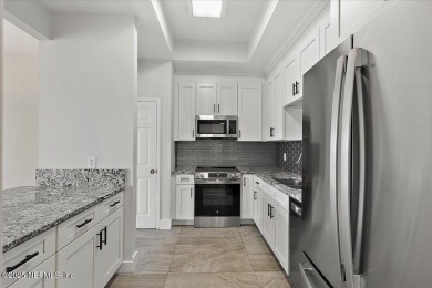 This first-floor, 2-bedroom, 2-bath condo with a large screen on Sawgrass Country Club  in Florida - for sale on GolfHomes.com, golf home, golf lot