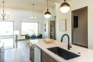 Welcome to your dream home! Nestled along the scenic 11th hole on The Golf Club At Redlands Mesa in Colorado - for sale on GolfHomes.com, golf home, golf lot