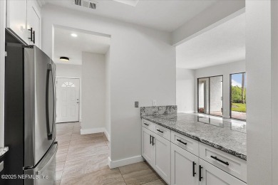 This first-floor, 2-bedroom, 2-bath condo with a large screen on Sawgrass Country Club  in Florida - for sale on GolfHomes.com, golf home, golf lot