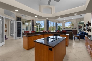 This fabulous Creekside home has it all!  An impressive circular on Bonita Bay West in Florida - for sale on GolfHomes.com, golf home, golf lot