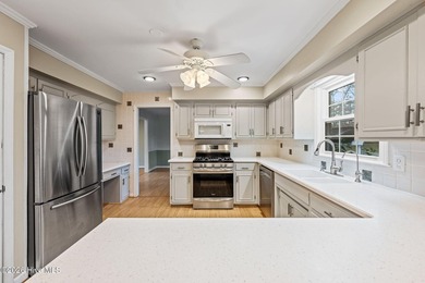 This lovely low-maintenance home features 4 BR, 2.5 baths, large on River Bend Golf and Country Club in North Carolina - for sale on GolfHomes.com, golf home, golf lot