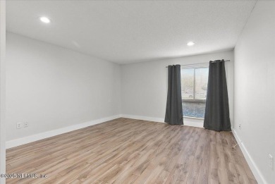This first-floor, 2-bedroom, 2-bath condo with a large screen on Sawgrass Country Club  in Florida - for sale on GolfHomes.com, golf home, golf lot