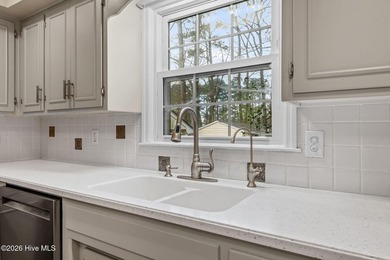 This lovely low-maintenance home features 4 BR, 2.5 baths, large on River Bend Golf and Country Club in North Carolina - for sale on GolfHomes.com, golf home, golf lot