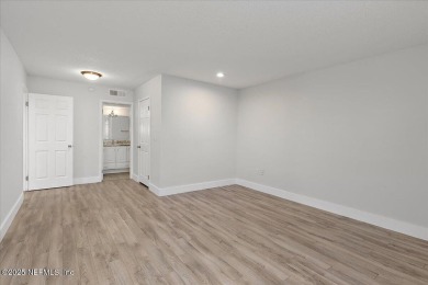 This first-floor, 2-bedroom, 2-bath condo with a large screen on Sawgrass Country Club  in Florida - for sale on GolfHomes.com, golf home, golf lot