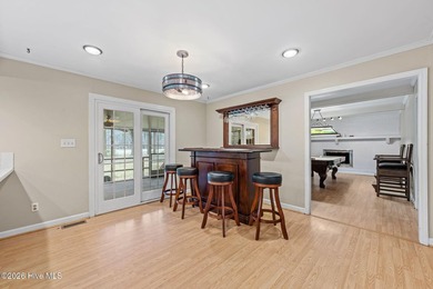 This lovely low-maintenance home features 4 BR, 2.5 baths, large on River Bend Golf and Country Club in North Carolina - for sale on GolfHomes.com, golf home, golf lot