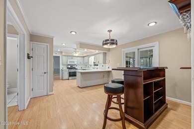 This lovely low-maintenance home features 4 BR, 2.5 baths, large on River Bend Golf and Country Club in North Carolina - for sale on GolfHomes.com, golf home, golf lot