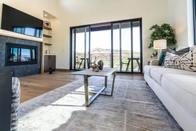 Welcome to your dream home! Nestled along the scenic 11th hole on The Golf Club At Redlands Mesa in Colorado - for sale on GolfHomes.com, golf home, golf lot