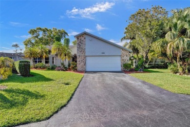 You will fall in love w/ this updated and gorgeous SFH!  3 BR 2 on Woodmont Country Club in Florida - for sale on GolfHomes.com, golf home, golf lot