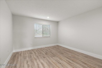 This first-floor, 2-bedroom, 2-bath condo with a large screen on Sawgrass Country Club  in Florida - for sale on GolfHomes.com, golf home, golf lot