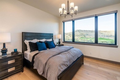 Welcome to your dream home! Nestled along the scenic 11th hole on The Golf Club At Redlands Mesa in Colorado - for sale on GolfHomes.com, golf home, golf lot