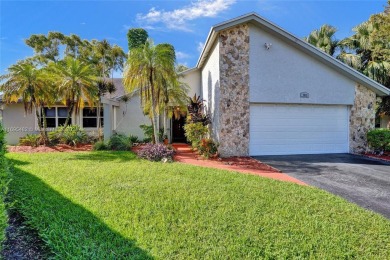 You will fall in love w/ this updated and gorgeous SFH!  3 BR 2 on Woodmont Country Club in Florida - for sale on GolfHomes.com, golf home, golf lot