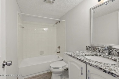 This first-floor, 2-bedroom, 2-bath condo with a large screen on Sawgrass Country Club  in Florida - for sale on GolfHomes.com, golf home, golf lot