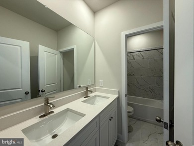 READY NOW-PHOTOS OF ACTUAL HOME!  This Laguna villa-style home on Plantation Lakes Golf and Country Club in Delaware - for sale on GolfHomes.com, golf home, golf lot