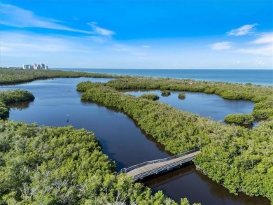 Panoramic Gulf Views from This Elegant 12th-Floor Condo at on Club at Pelican Bay Golf Course in Florida - for sale on GolfHomes.com, golf home, golf lot