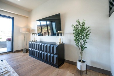 Welcome to your dream home! Nestled along the scenic 11th hole on The Golf Club At Redlands Mesa in Colorado - for sale on GolfHomes.com, golf home, golf lot