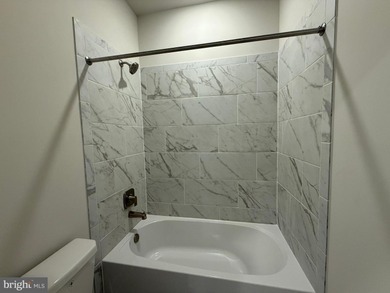 READY NOW-PHOTOS OF ACTUAL HOME!  This Laguna villa-style home on Plantation Lakes Golf and Country Club in Delaware - for sale on GolfHomes.com, golf home, golf lot