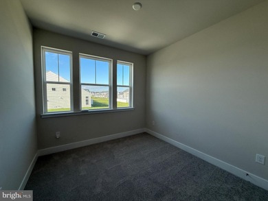 READY NOW-PHOTOS OF ACTUAL HOME!  This Laguna villa-style home on Plantation Lakes Golf and Country Club in Delaware - for sale on GolfHomes.com, golf home, golf lot