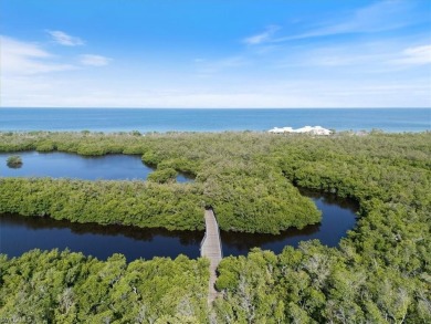 Panoramic Gulf Views from This Elegant 12th-Floor Condo at on Club at Pelican Bay Golf Course in Florida - for sale on GolfHomes.com, golf home, golf lot