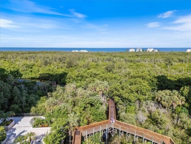 Panoramic Gulf Views from This Elegant 12th-Floor Condo at on Club at Pelican Bay Golf Course in Florida - for sale on GolfHomes.com, golf home, golf lot
