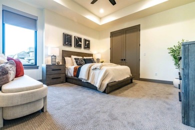 Welcome to your dream home! Nestled along the scenic 11th hole on The Golf Club At Redlands Mesa in Colorado - for sale on GolfHomes.com, golf home, golf lot
