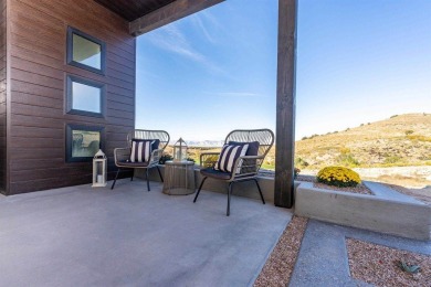 Welcome to your dream home! Nestled along the scenic 11th hole on The Golf Club At Redlands Mesa in Colorado - for sale on GolfHomes.com, golf home, golf lot