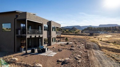 Welcome to your dream home! Nestled along the scenic 11th hole on The Golf Club At Redlands Mesa in Colorado - for sale on GolfHomes.com, golf home, golf lot