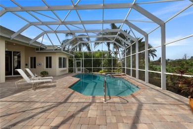 This fabulous Creekside home has it all!  An impressive circular on Bonita Bay West in Florida - for sale on GolfHomes.com, golf home, golf lot