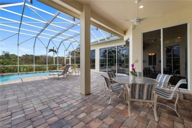 This fabulous Creekside home has it all!  An impressive circular on Bonita Bay West in Florida - for sale on GolfHomes.com, golf home, golf lot