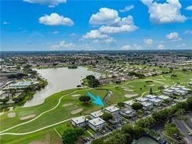 Enjoy breathtaking panoramic views of the golf course, lakes on  in Florida - for sale on GolfHomes.com, golf home, golf lot