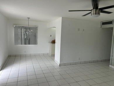 Enjoy breathtaking panoramic views of the golf course, lakes on  in Florida - for sale on GolfHomes.com, golf home, golf lot