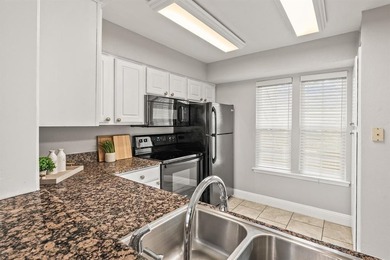 Charming first-floor 1-bedroom, 1.5-bath condo in a gated Far on Prestonwood Country Club - Dallas County in Texas - for sale on GolfHomes.com, golf home, golf lot