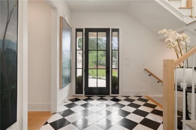 Stunning newer construction with modern flair, ideally located on Bobby Jones Golf Club in Georgia - for sale on GolfHomes.com, golf home, golf lot