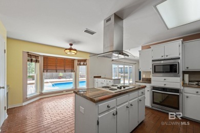 One of the few homes in Lake Forest with a private pool! Located on Lake Forest Yacht and Country Club in Alabama - for sale on GolfHomes.com, golf home, golf lot
