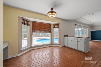 One of the few homes in Lake Forest with a private pool! Located on Lake Forest Yacht and Country Club in Alabama - for sale on GolfHomes.com, golf home, golf lot