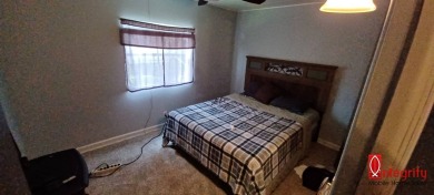 Come settle down and relax in a beautiful manufactured home with on Fairways Country Club in Florida - for sale on GolfHomes.com, golf home, golf lot