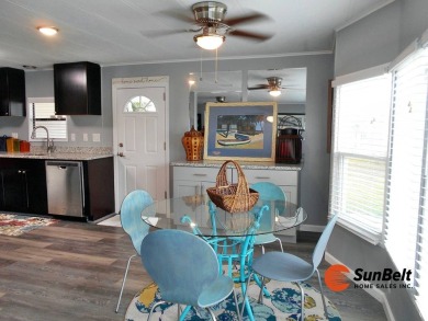 Rolling Greens Village is a friendly resort-style 55+ community on Rolling Greens Executive Golf Community in Florida - for sale on GolfHomes.com, golf home, golf lot