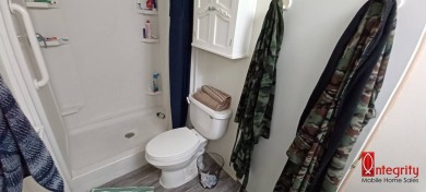 Come settle down and relax in a beautiful manufactured home with on Fairways Country Club in Florida - for sale on GolfHomes.com, golf home, golf lot