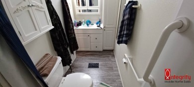 Come settle down and relax in a beautiful manufactured home with on Fairways Country Club in Florida - for sale on GolfHomes.com, golf home, golf lot