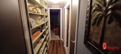 Come settle down and relax in a beautiful manufactured home with on Fairways Country Club in Florida - for sale on GolfHomes.com, golf home, golf lot