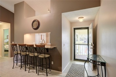 Beautifully furnished condo in gated community East of US 1 on Pelican Pointe 9 Hole Course in Florida - for sale on GolfHomes.com, golf home, golf lot