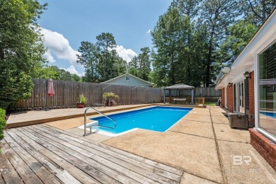 One of the few homes in Lake Forest with a private pool! Located on Lake Forest Yacht and Country Club in Alabama - for sale on GolfHomes.com, golf home, golf lot