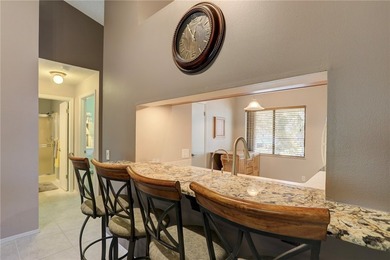 Beautifully furnished condo in gated community East of US 1 on Pelican Pointe 9 Hole Course in Florida - for sale on GolfHomes.com, golf home, golf lot