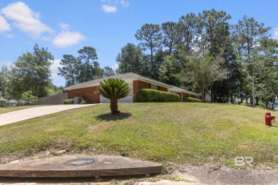 One of the few homes in Lake Forest with a private pool! Located on Lake Forest Yacht and Country Club in Alabama - for sale on GolfHomes.com, golf home, golf lot