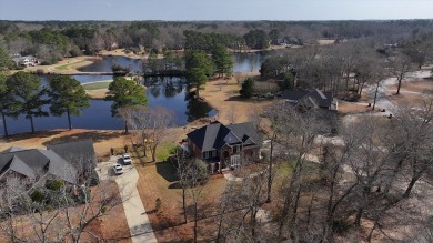 You've found THE ONE. Breathtaking waterfront home overlooking on The Links At Lakewood in South Carolina - for sale on GolfHomes.com, golf home, golf lot