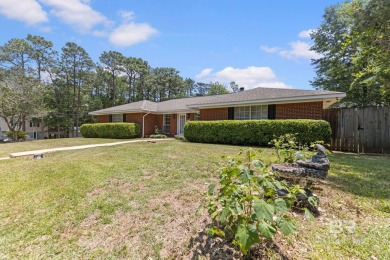 One of the few homes in Lake Forest with a private pool! Located on Lake Forest Yacht and Country Club in Alabama - for sale on GolfHomes.com, golf home, golf lot