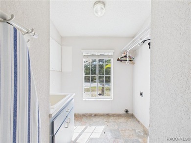 Charming 3-bedroom, 2-bathroom pool home nestled in the serene on Sugarmill Woods Golf and Country Club in Florida - for sale on GolfHomes.com, golf home, golf lot