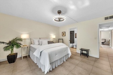 Experience unparalleled luxury in this reduced price *stunning* on Wynmoor Golf Course in Florida - for sale on GolfHomes.com, golf home, golf lot