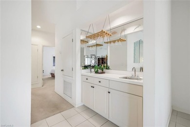 Welcome to 16540 Heron Coach Way #406 in The Forest, a gated on The Forest Country Club in Florida - for sale on GolfHomes.com, golf home, golf lot