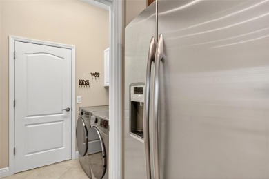 VERY WELCOMING and spacious with SO MANY UPGRADES home in this on Boca Royale Golf and Country Club in Florida - for sale on GolfHomes.com, golf home, golf lot