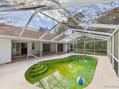 Charming 3-bedroom, 2-bathroom pool home nestled in the serene on Sugarmill Woods Golf and Country Club in Florida - for sale on GolfHomes.com, golf home, golf lot